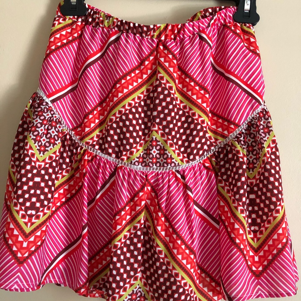 Pink skater skirt.